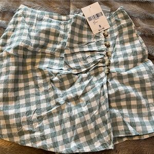 Teal and white skort size S.